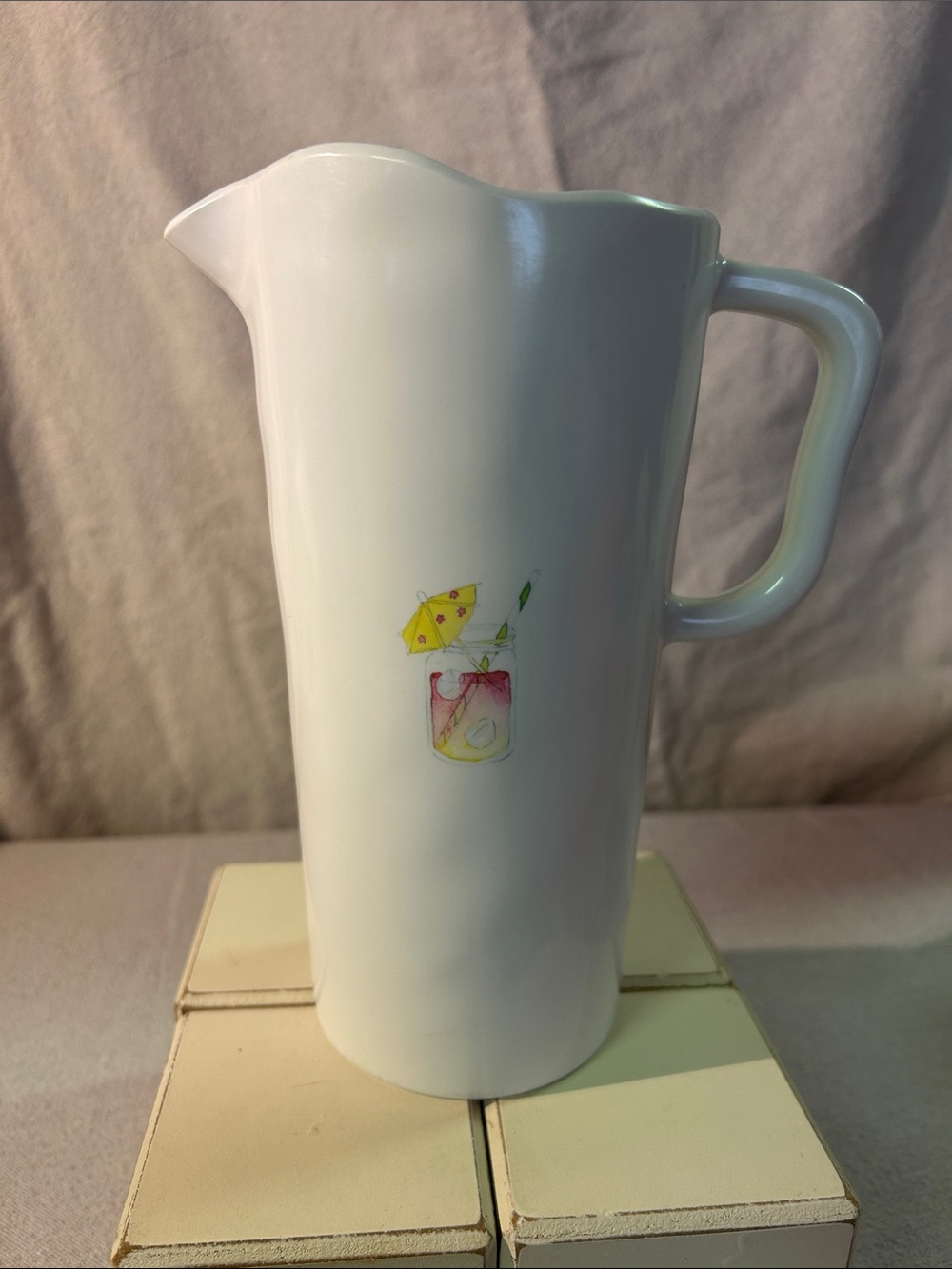 Rae Dunn White Ceramic Pitcher with Yellow Umbrella Drink Accent
